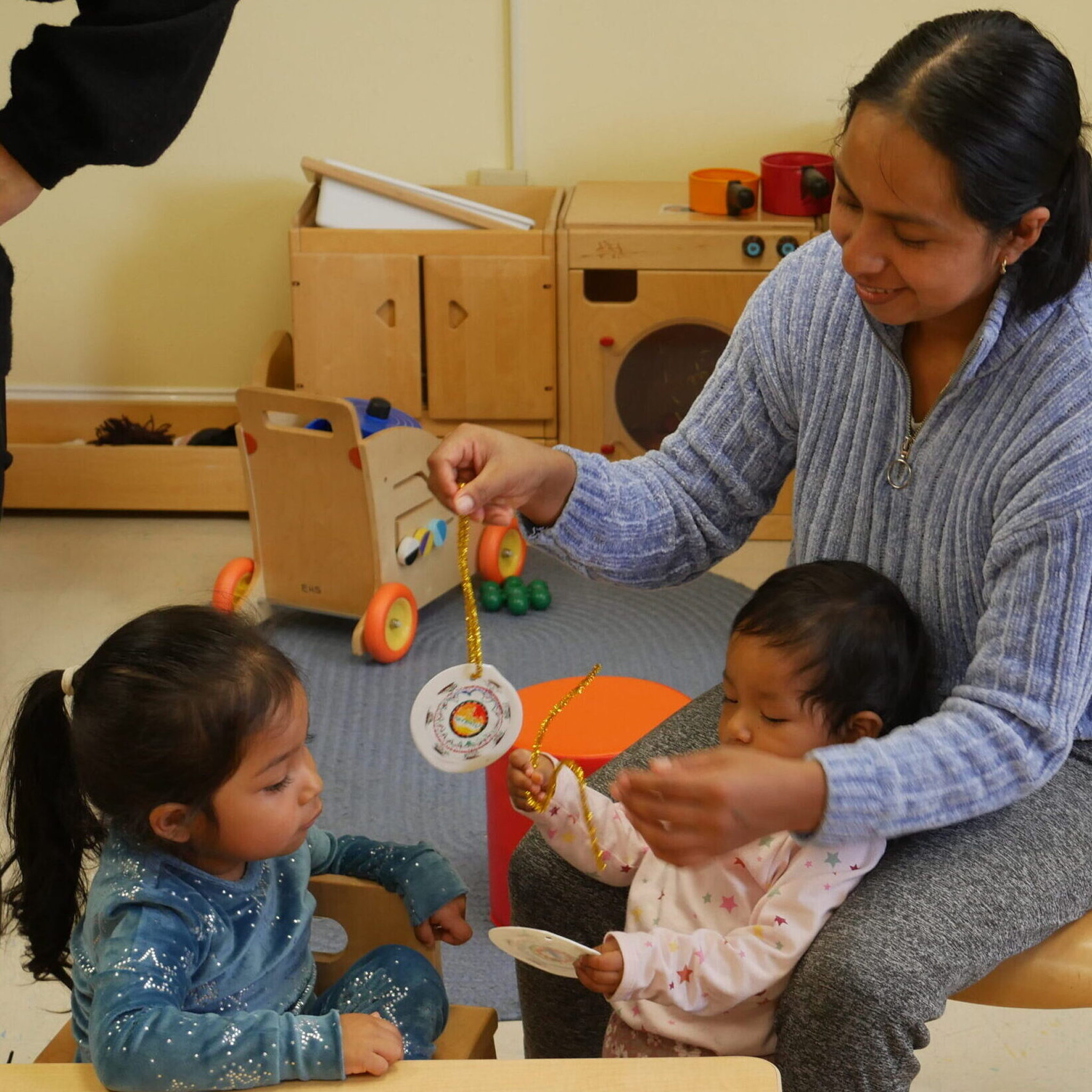 A mom smiling with her kid